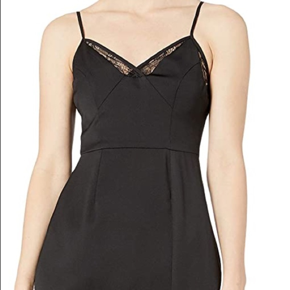 BCBG Black Satin Slip Dress with lace detail and slit. New with tags. Size 8